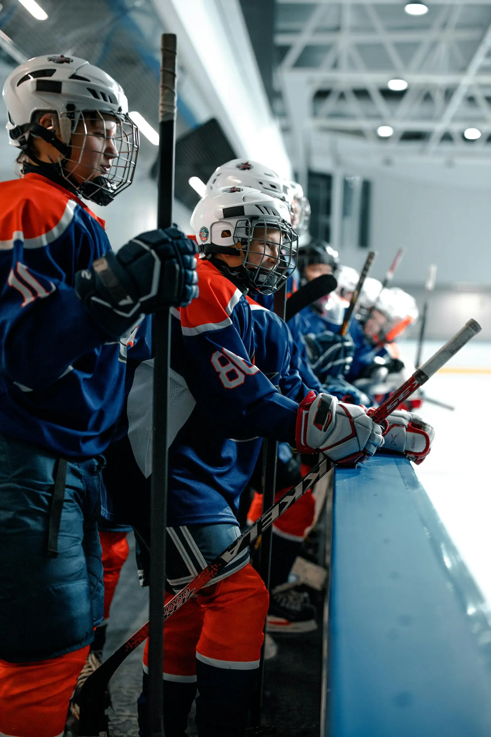Youth hockey team gathered at the bench